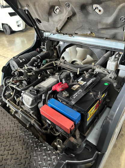 7740327